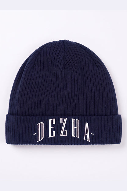 DEZHA BEANIE aus 100 % Baumwolle mit doppellagigem Strick, leichtem Gewebe und klassischem Umschlagdesign.