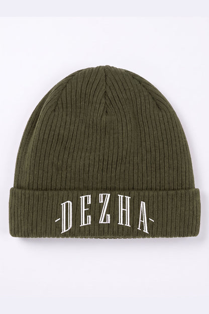 DEZHA BEANIE aus 100 % Baumwolle mit doppellagigem Strick, leichtem Gewebe und klassischem Umschlagdesign.