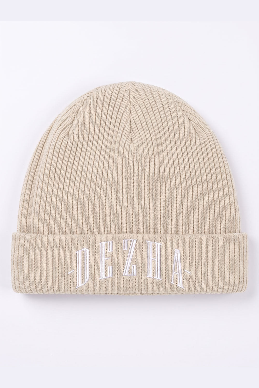 DEZHA BEANIE aus 100 % Baumwolle mit doppellagigem Strick, leichtem Gewebe und klassischem Umschlagdesign.